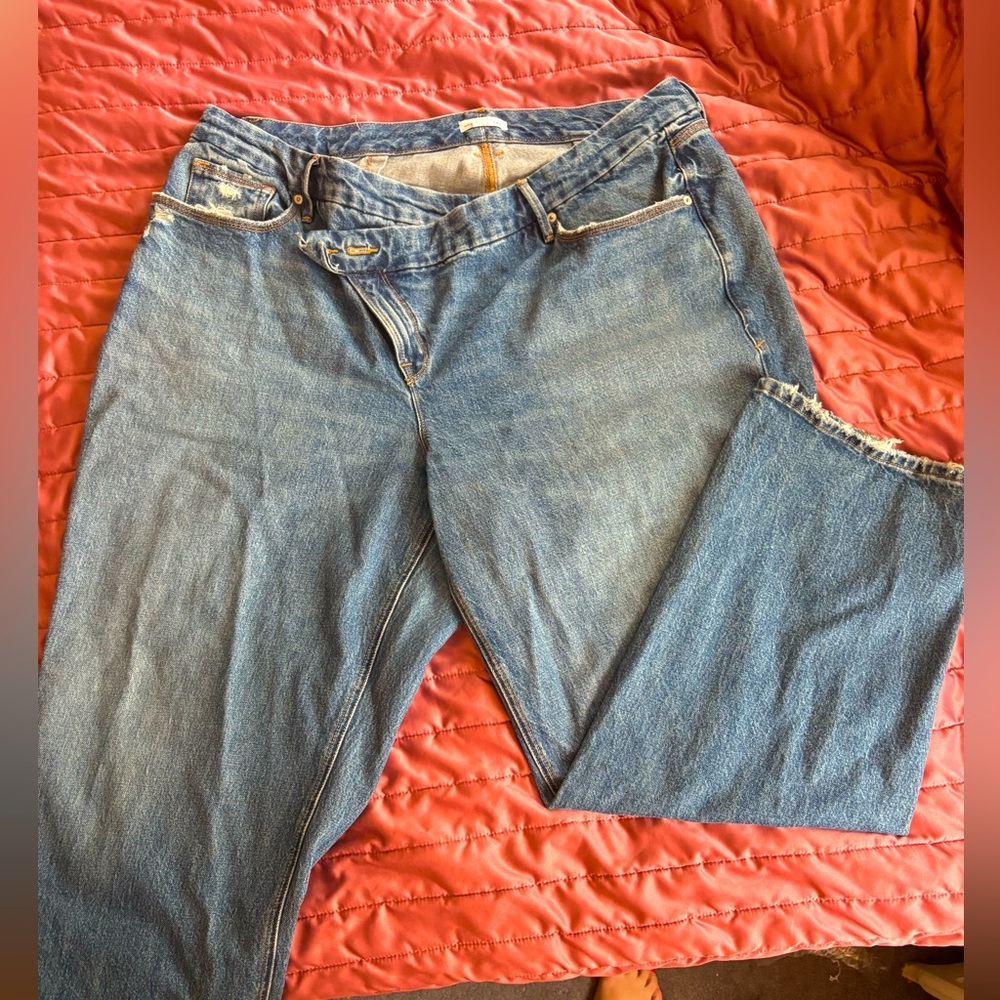 Good American 90s baggy crossover waistband jean